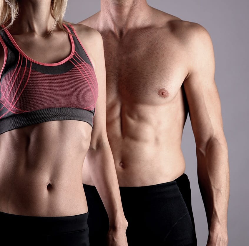 Man and woman with smooth abdomen after medical spa body services