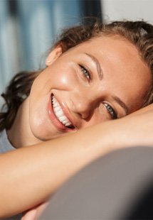 closeup of young woman smiling 