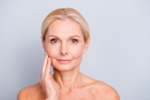 Older woman with beautiful skin after microneedling in Houston